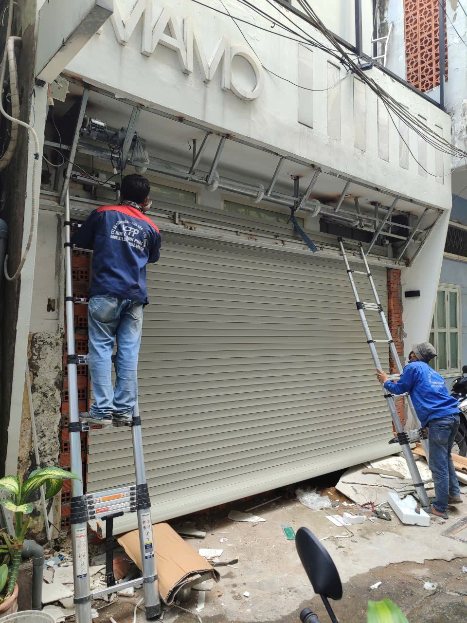 Thay ắc quy bình lưu điện cửa cuốn Sửa Cửa Cuốn Quận Ô Môn